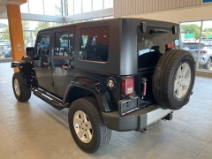 Used 2009 Jeep Wrangler Unlimited 4d Convertible 4WD Sahara at Suburban Ford of Sterling Heights near Sterling Heights, MI